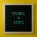 Letter board with 'THERE IS HOPE' message against a vibrant yellow backdrop.